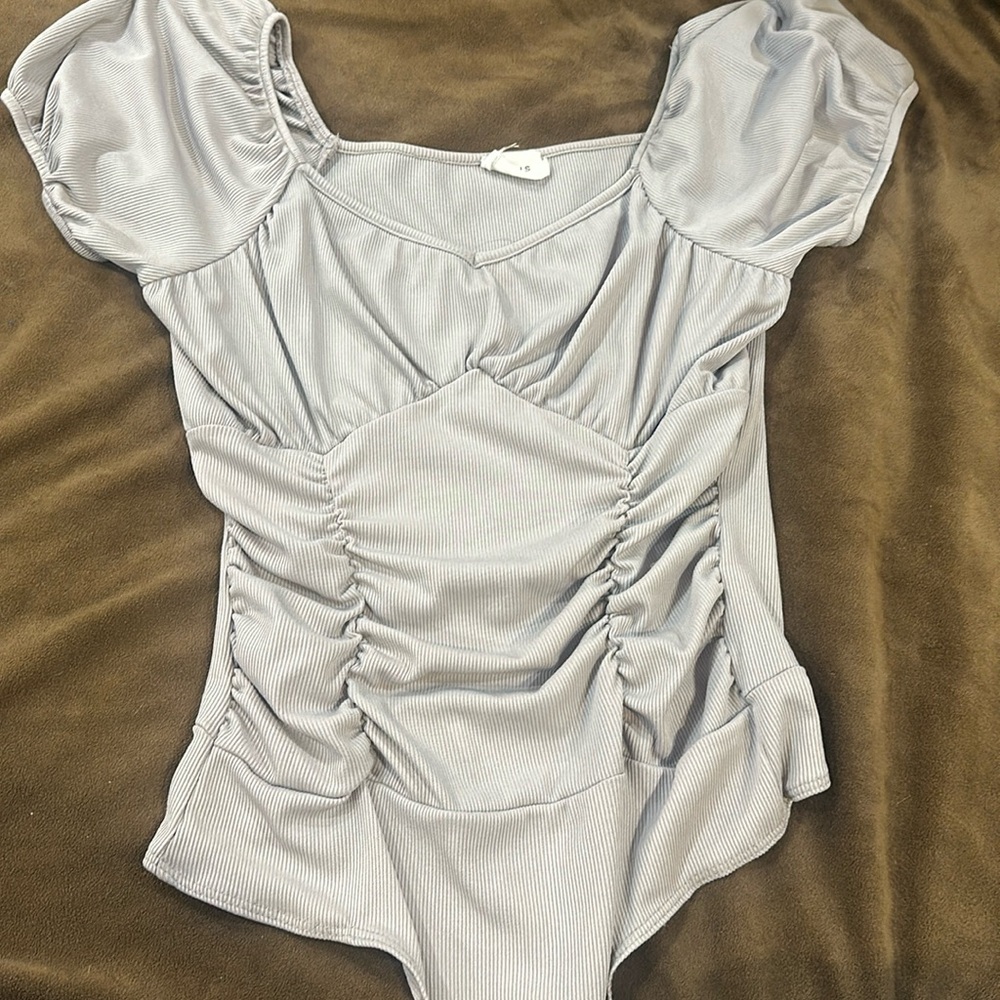 Gray body suit boutique